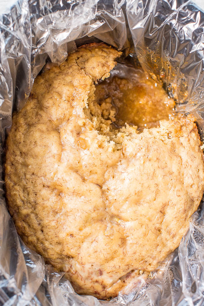 Slow Cooker Banana Bread Cake with Brown Sugar Sauce - Soft, tender banana bread with a caramely, brown sugar sauce that develops while the bread cooks!! If you've never made dessert in your slow cooker, start with this easy recipe!!