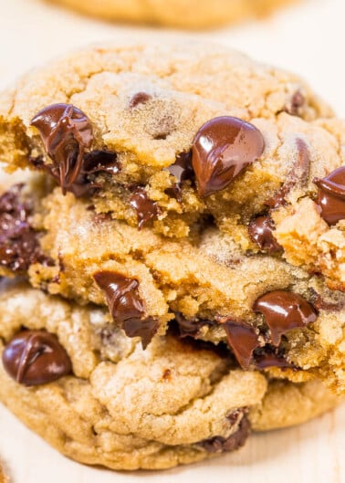 Close-up of a chewy chocolate chip cookie with melted chocolate chips.