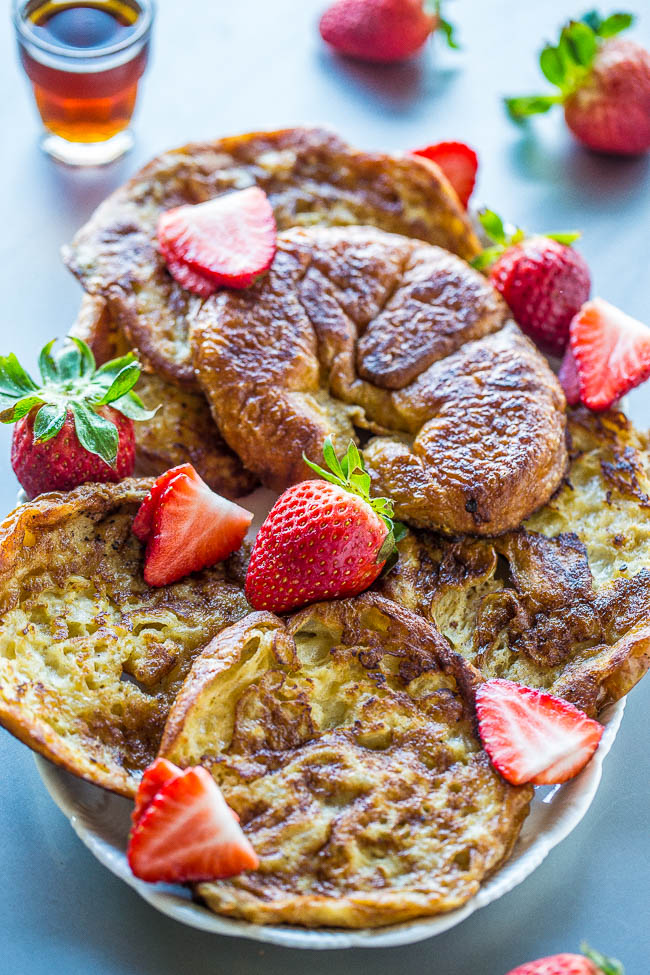 croissant french toast slices on a white platter 