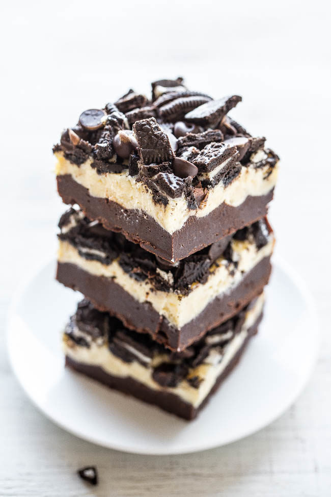 Loaded Oreo Cream Cheese Brownies - Ultra fudgy brownies topped with cream cheese, white chocolate chips, chocolate chips, and Oreos!! LOADED to the MAX and soooo good! Easy, no mixer recipe that's as easy as using a mix!!
