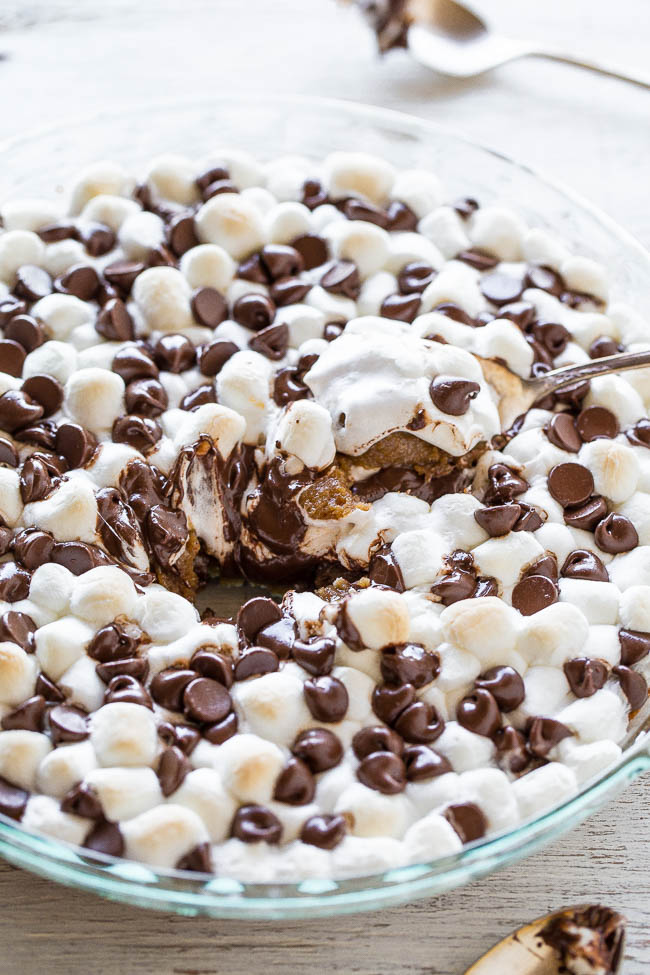 overhead view of a smores pie with a spoon in the middle