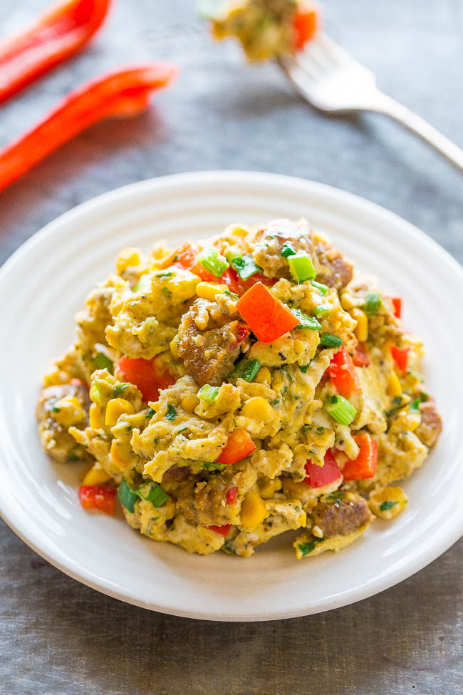 Loaded Southwestern Scramble - Don't settle for plain scrambled eggs when you can have these!! Peppers, onions, corn, and more for flavor and texture! Easy, ready in 10 minutes, and healthy!!