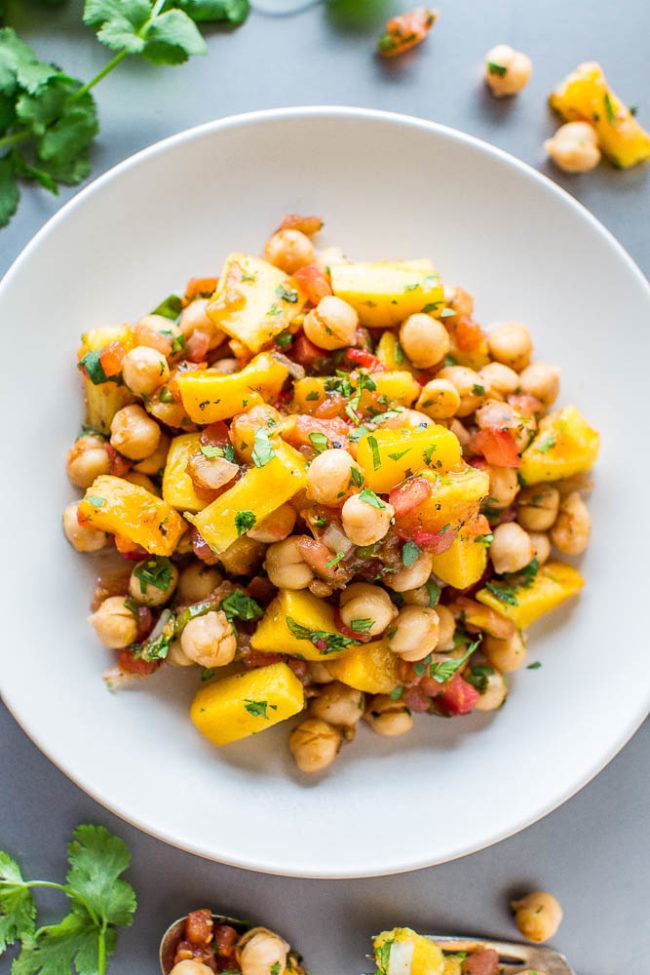 Tropical Chickpea Salad - Pineapple, mango, pineapple salsa, and pico de gallo tossed with chickpeas for a salad that tastes like a tropical vacation!! Easy, ready in 5 minutes, loaded with sweet-yet-savory flavor, and so healthy!!
