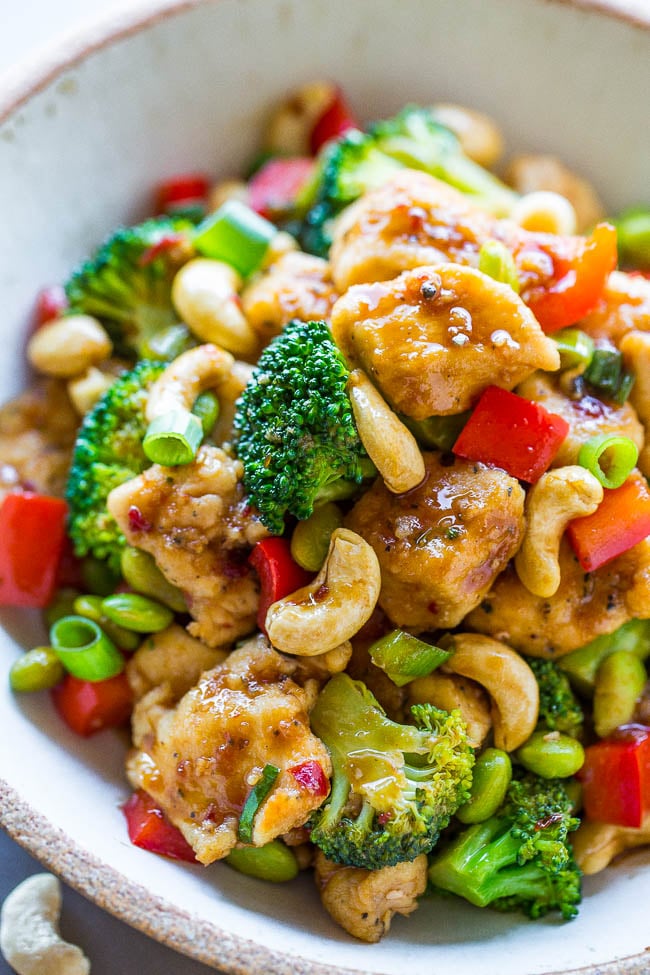 Better-Than-Takeout Cashew Chicken - Juicy chicken, crisp-tender vegetables, and crunchy cashews coated with the best garlicky soy sauce!! Skip takeout and make your own restaurant-quality meal that's easy, ready in 20 minutes, and healthier!!