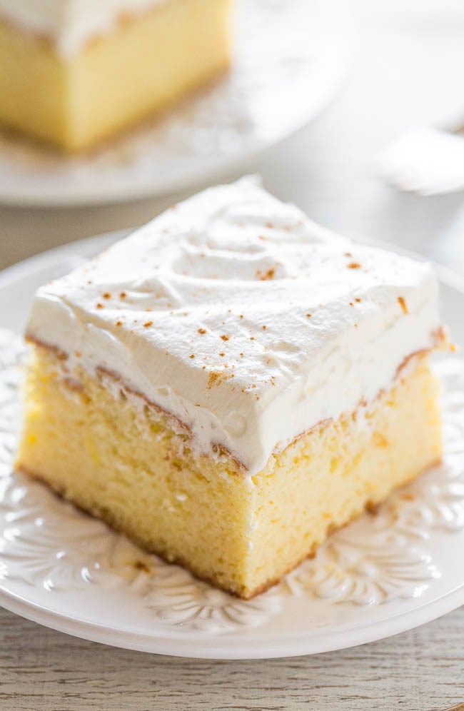 The Best Tres Leches Cake - Soft, tender, and soaked with three milks! It just melts in your mouth and it's the BEST tres leches cake ever!! You need to try this AMAZING cake!!