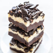 Oreo brownies piled high on plate.