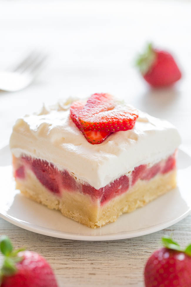 Strawberry Bars — Easy, no mixer bars with a shortbread crust, one pound of fresh berries, a layer of sweet custard, and creamy whipped topping!! A perfect warm weather dessert that everyone LOVES!!