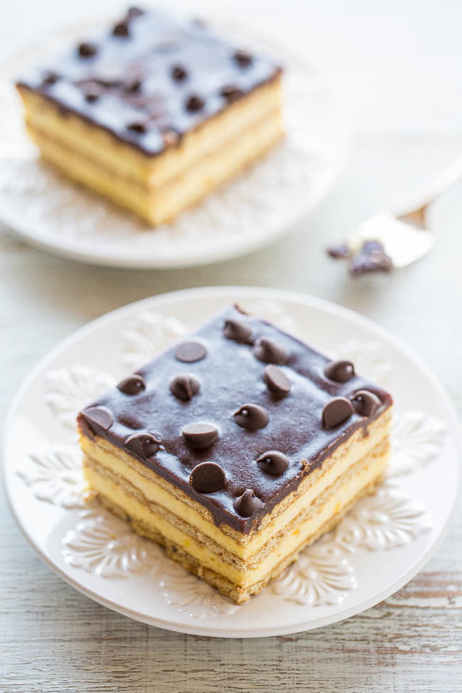 Boston Cream Icebox Cake - Boston cream PIE meets an ECLAIR in an easy no-mixer, no-bake dessert!! Vanilla pudding, whipped topping, graham crackers, and lots of chocolate! Perfect for parties or anytime you don't want to turn on your oven!!