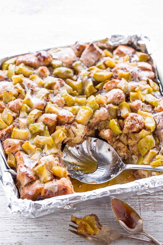 Caramel Apple Cinnamon Roll Bake - The soft and gooey factor of a CINNABON with apples and so much CARAMEL SAUCE!! Easy, ready in 30 minutes, and uses storebought cinnamon roll dough to save time! One of the BEST desserts ever!!