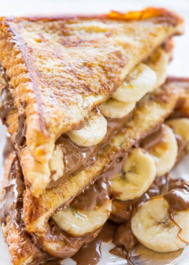 Grilled sandwich with melted chocolate and banana slices.