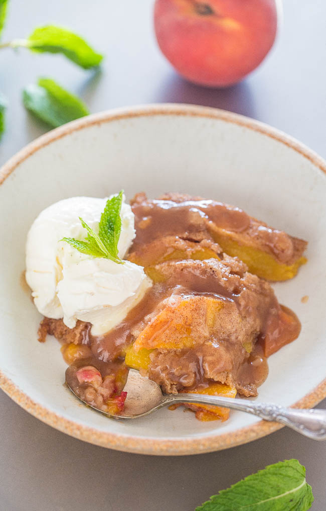 Easy Peach Cobbler (with Fresh Peaches!) — Don't settle for boring peach cobbler when you can have this EASY version that's packed with cinnamon-sugar flavor!! Everything is coated in an AMAZING sauce! Your new GO-TO peach cobbler recipe!!