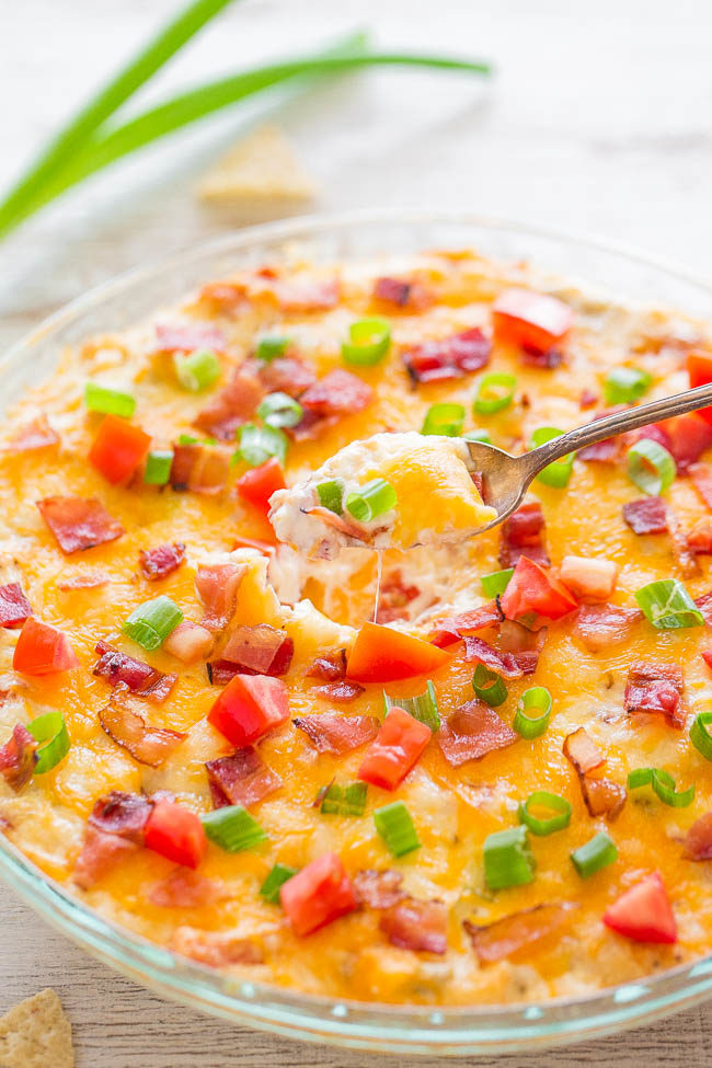 BLT Dip — This cheesy BLT dip is loaded with two types of cheese, bacon, fresh tomatoes, and more!