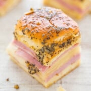 Poppy seed-topped pastry with layers of ham and cheese.