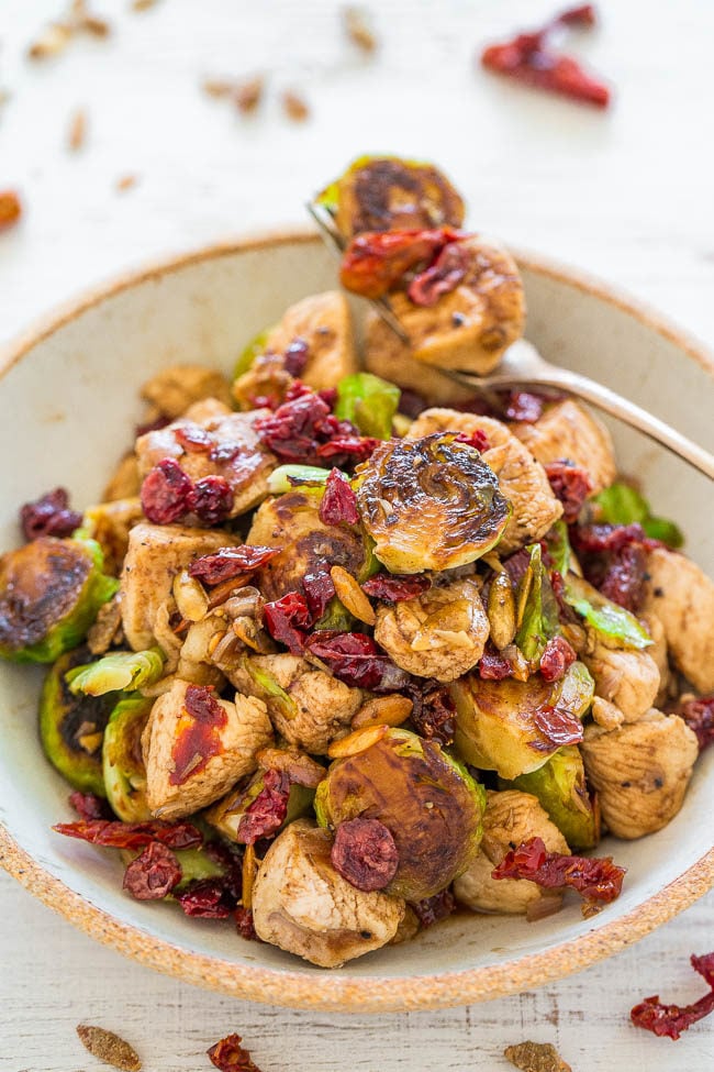 Balsamic Chicken, Brussels Sprouts, Cranberries and Pumpkin Seeds - EASY, hearty, HEALTHY, one-skillet dish that's ready in 20 minutes!! Juicy chicken, crisp-tender sprouts, chewy cranberries and crunchy pumpkin seeds!