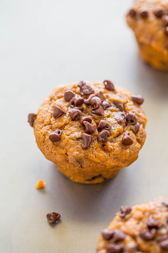 Mini Pumpkin Chocolate Chip Muffins — Easy, no mixer recipe for the SOFTEST, moistest, most ADORABLE little muffins ever!! Rich PUMPKIN flavor and CHOCOLATE in every bite!!