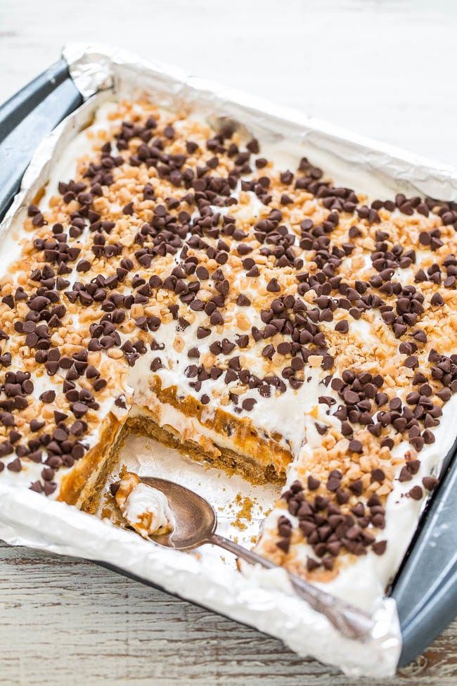 Pumpkin Lush - EASY layered dessert with a graham cracker crust, cream cheese, pudding, PUMPKIN, whipped topping, chocolate chips, and toffee bits!! A little bit of CRUNCH with lots of fluffy CREAMINESS!!