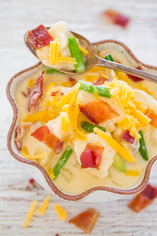 A bowl and spoonful of Loaded Baked Potato Soup 