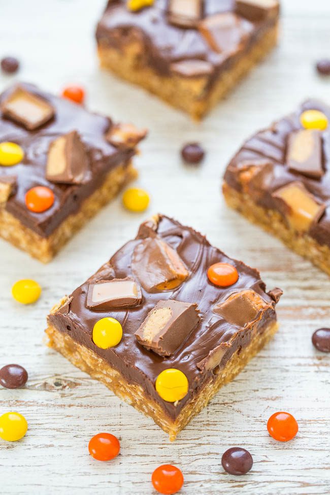 Chocolate Peanut Butter Candy Bars - Easy, no-bake, soft, chewy PEANUT BUTTER bars topped with CHOCOLATE and CANDY!! Great for using up Halloween or extra candy because you can top with any candy!!