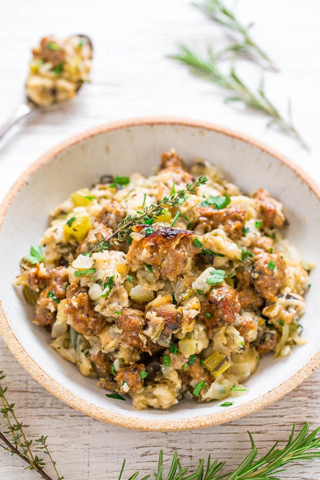 Slow Cooker Sausage Stuffing - EASY stuffing that's full of flavor from the sausage, onions, and more!! You don't even need to brown the sausage first and everything cooks together! A time and oven-space saver on holidays!!