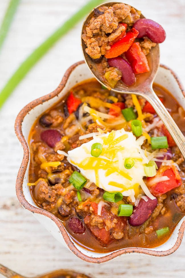 Overhead shot of Slow Cooker Beef Chili in a bowl with a spoonful