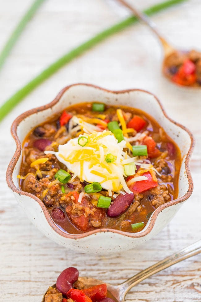 Slow Cooker Beef Chili - EASY, hearty, comfort food!! As the chili simmers in your slow cooker it develops so much FLAVOR! A foolproof chili recipe that you'll want to add into your regular rotation!!