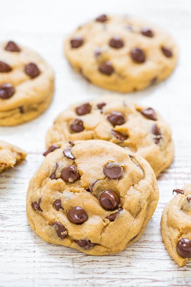 Easy Soft and Chewy Chocolate Chip Cookies - Big bakery-style cookies made in ONE bowl and NO mixer required!! Soft and buttery, perfectly chewy, and loaded with CHOCOLATE! It's hard to eat just one!!