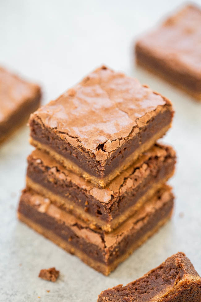 Peanut Butter Brookies - A soft and chewy peanut butter COOKIE base with fudgy BROWNIES on top!! For peanut butter + chocolate lovers, this EASY no-mixer recipe is the best of both worlds!!