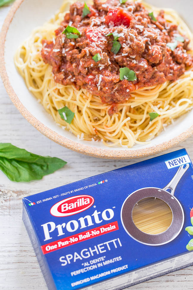 simple spaghetti with meat sauce next to bow of Barilla pasta