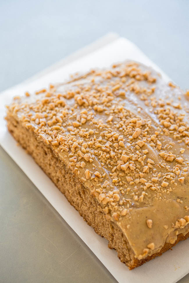 Toffee Spice Cake with Brown Sugar Caramel Frosting - An EASY, soft, and fluffy spice cake with toffee bits inside and on top!! The frosting is AMAZING and takes this cake over the top!!