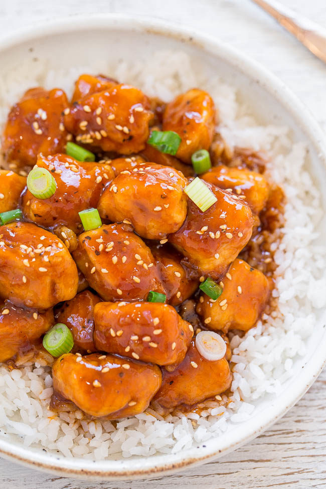 Sesame Mango Chicken with rice in a bowl