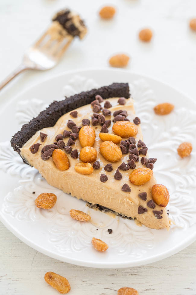 No-Bake Peanut Butter Silk Oreo Pie - An EASY no-bake pie with a crunchy Oreo crust, a creamy salty-sweet peanut butter filling, and topped with peanuts and chocolate chips!! Tastes AMAZING!!