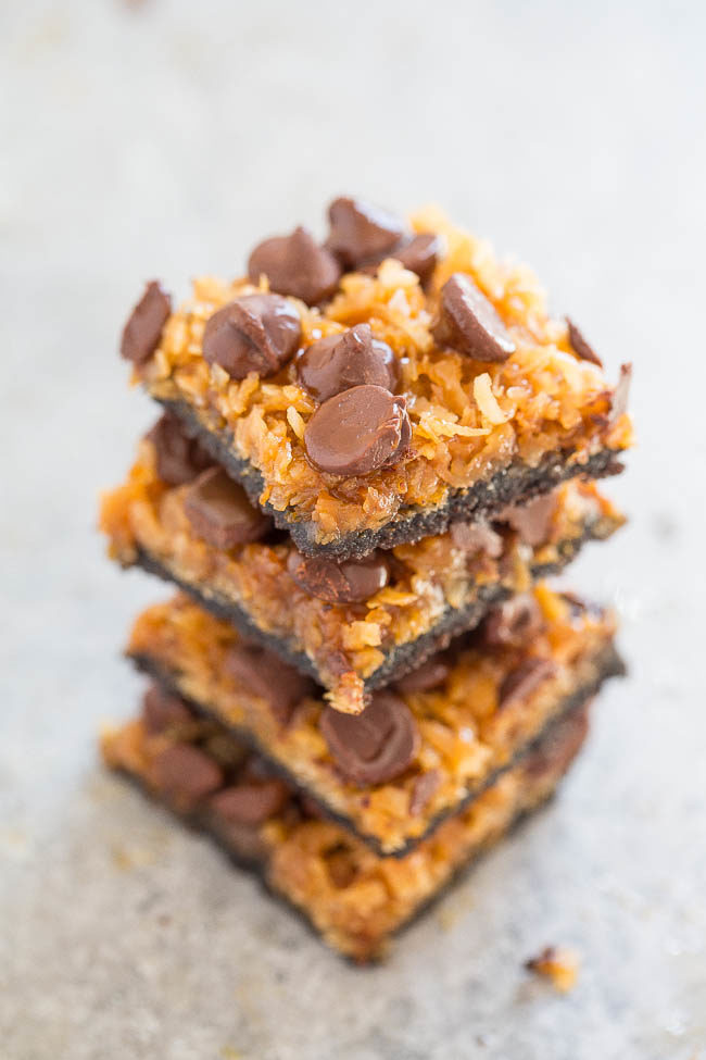 Better-Than-Girl-Scout Samoas Cookie Bars - Resembles Samoas but BETTER!! An Oreo crust topped with coconut, chocolate chips, and drenched in salted caramel!! Chewy, rich, decadent, and EASY!!
