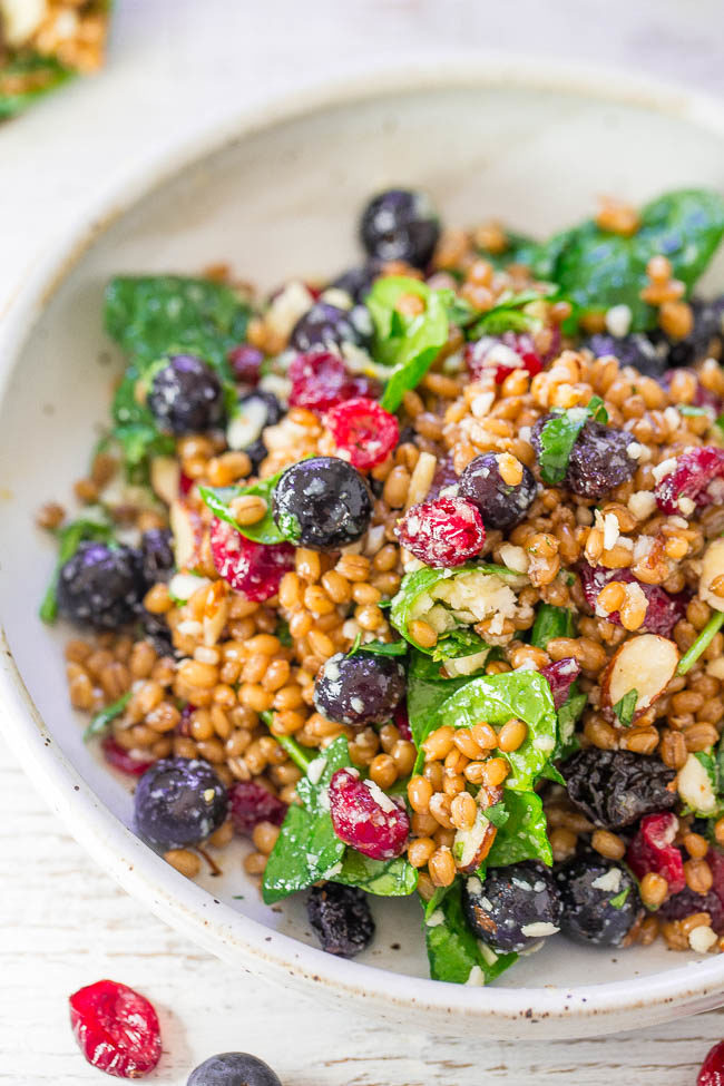 Spinach Blueberry Superfoods Salad - So many textures and flavors in this hearty salad filled with SUPERFOODS!! Spinach, blueberries, dried cranberries, almonds, and more! EASY, satisfying, healthy, and tastes amazing!! 
