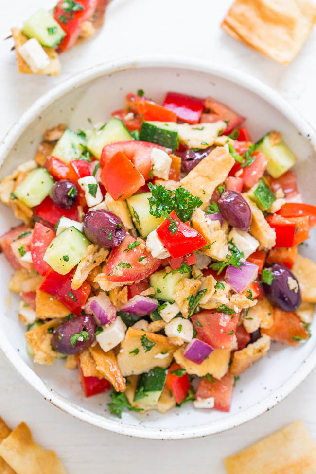 Greek Pita Chip Salad - Greek salad just got a makeover!! Still uses classic ingredients like red peppers, cucumbers, onions, olives, and feta but now there are PITA CHIPS for extra crunch and texture! EASY, HEALTHY, ready in 10 minutes!!