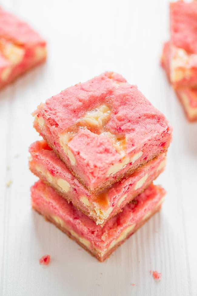 Strawberry White Chocolate Gooey Bars - An EASY five-ingredient recipe for soft and chewy strawberry bars studded with white chocolate chips and spiked with sweetened condensed milk for the GOOEY win!!