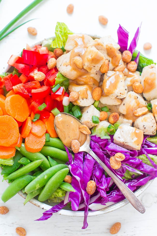 Thai Peanut Salad — Eat the RAINBOW with this EASY, healthy salad that's ready in 20 minutes!! Juicy chicken and crisp vegetables are tossed in the BEST PEANUT SALAD DRESSING ever!!