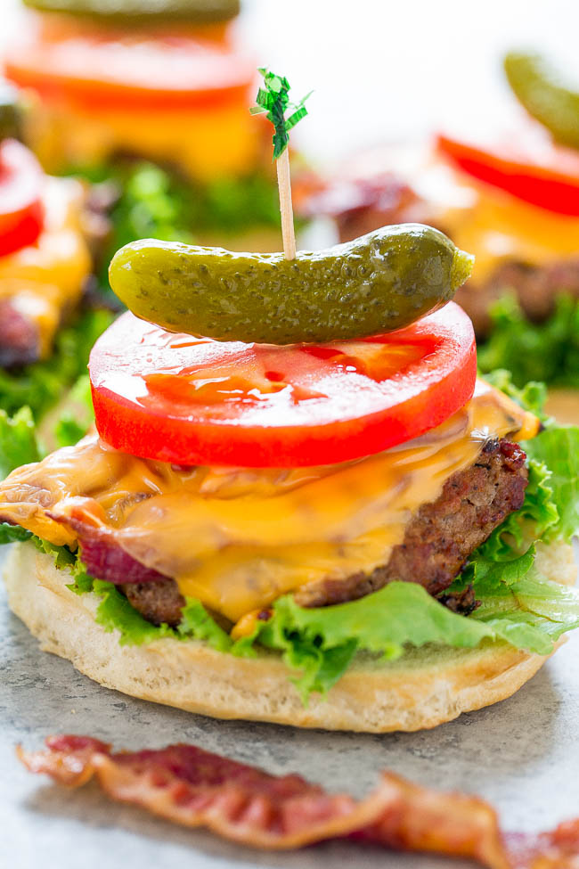 BLT Grilled Turkey Burgers — JUICY turkey burgers topped with cheese, bacon, lettuce, and tomato!! EASY, ready in 15 minutes, and perfect for summer parties!! Healthier than beef and IRRESISTIBLE!!