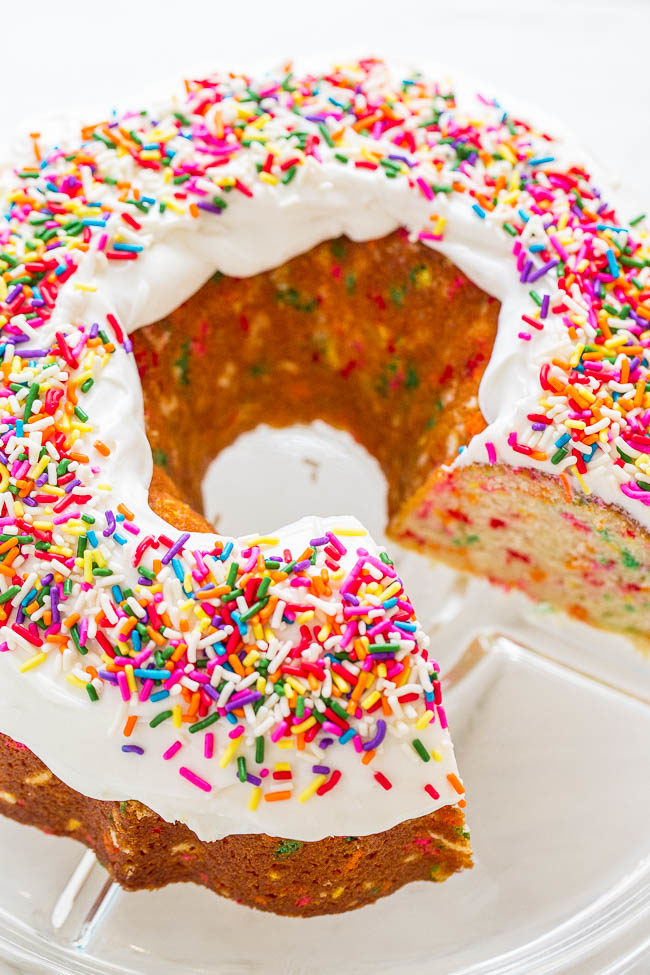 Easy Homemade Funfetti Bundt Cake - NO cake mix in this 100% HOMEMADE funfetti cake that's loaded with sprinkles and tastes amazing!! Fast, EASY, and the BEST scratch funfetti cake recipe!!