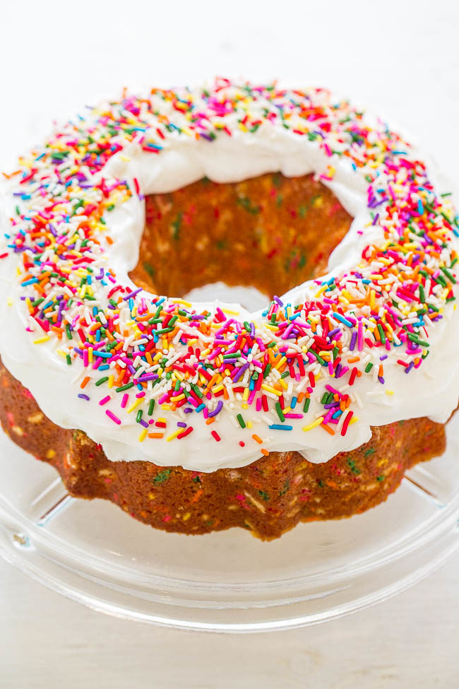 Easy Homemade Funfetti Bundt Cake - NO cake mix in this 100% HOMEMADE funfetti cake that's loaded with sprinkles and tastes amazing!! Fast, EASY, and the BEST scratch funfetti cake recipe!!