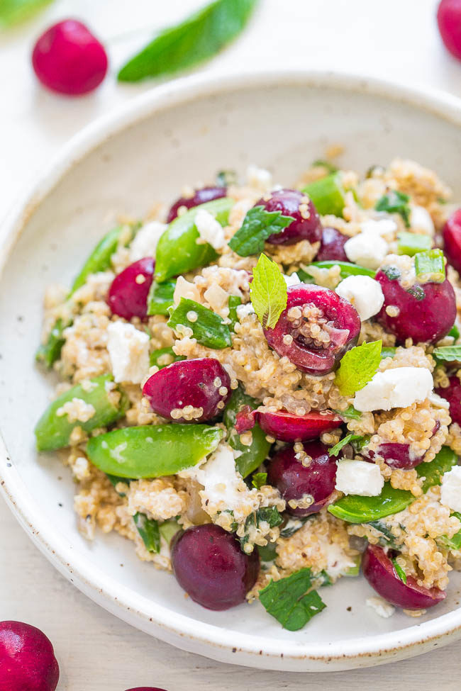 Quinoa, Cherry, and Goat Cheese Salad - Healthy, EASY, and loaded with juicy cherries, tangy goat cheese, snap peas, mint, and more!! The PERFECT light yet satisfying salad with so many great flavors!! 