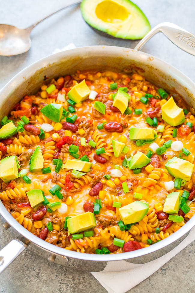 One Skillet Beef Taco Pasta - An EASY recipe that's ready in 20 minutes, made in ONE skillet, and loaded with Mexican-inspired flavors!! A family favorite that's great for busy weeknights!!