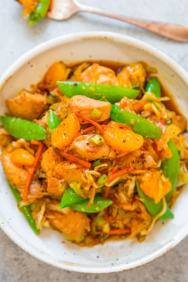 Mandarin Chicken Stir Fry with veggies in white bowl