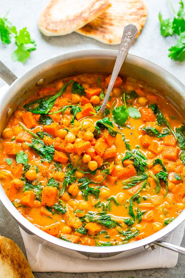 Sweet Potato and Chickpea Coconut Curry - An EASY one-skillet curry that's ready in 30 minutes and is layered with so many fabulous flavors!! HEALTHY comfort food that tastes AMAZING!!
