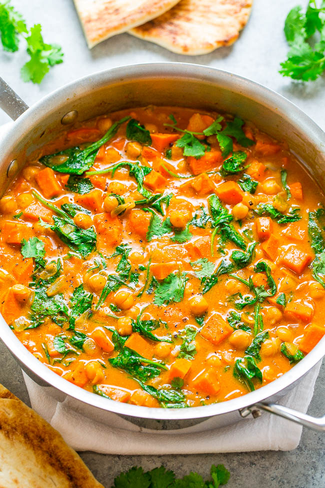 Sweet Potato and Chickpea Coconut Curry - An EASY one-skillet curry that's ready in 30 minutes and is layered with so many fabulous flavors!! HEALTHY comfort food that tastes AMAZING!!