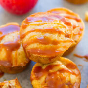 Freshly baked apple muffins drizzled with caramel sauce.