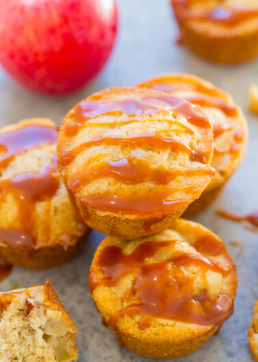 Freshly baked apple muffins drizzled with caramel sauce.