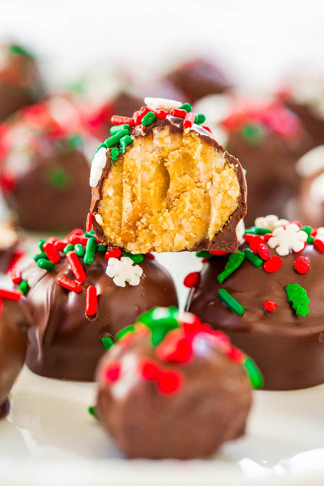 Chocolate Peanut Butter Balls decorated with holiday sprinkles