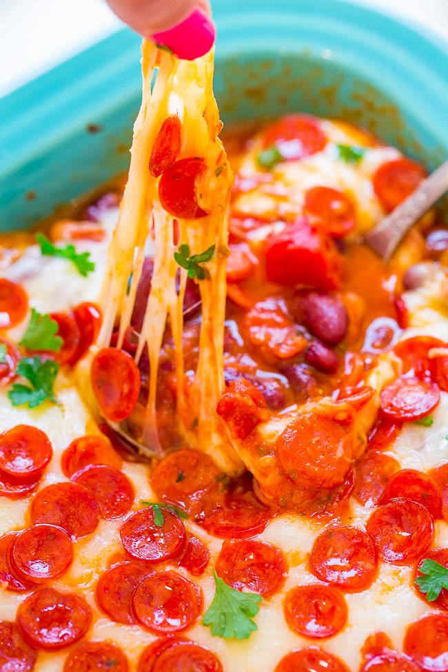 Pepperoni Pizza Baked Beans - PIZZA-inspired flavors in this EASY recipe that works great as an appetizer, side dish, or FAST weeknight dinner!! Tomatoes, oregano, pepperoni, and oodles of melted CHEESE!!