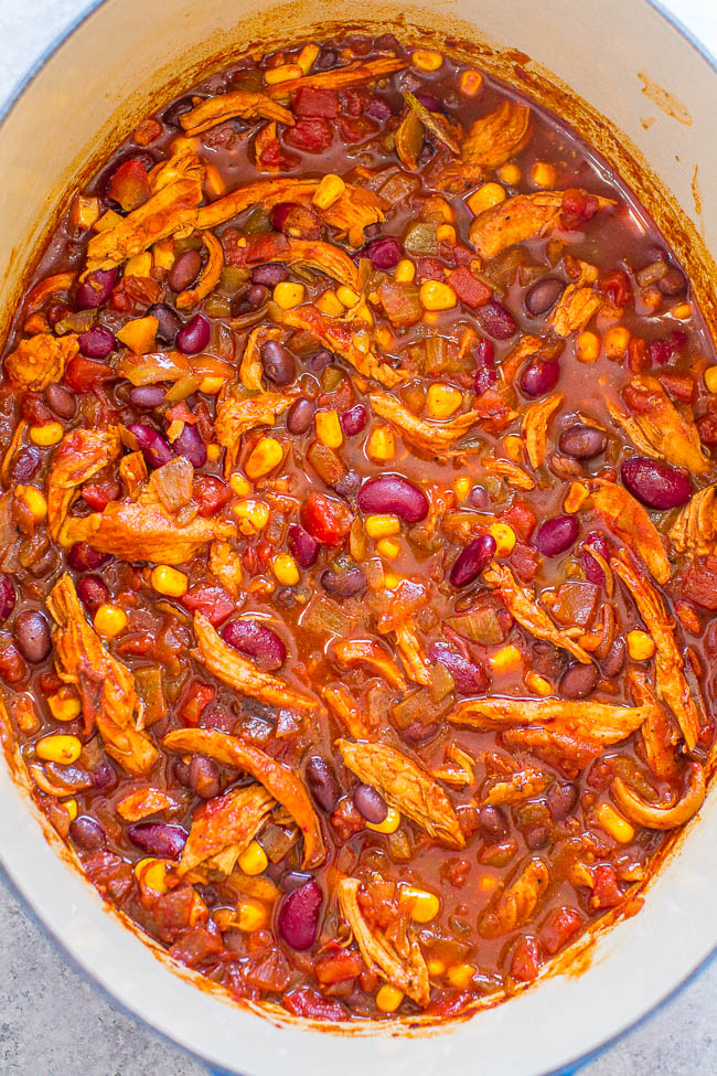 Easy 30-Minute Chicken Enchilada Chili - Don't have all day for chili to simmer? No problem! This EASY, hearty, healthier chili full of Mexican-inspired flavors is ready in 30 minutes! Perfect for busy weeknights!!