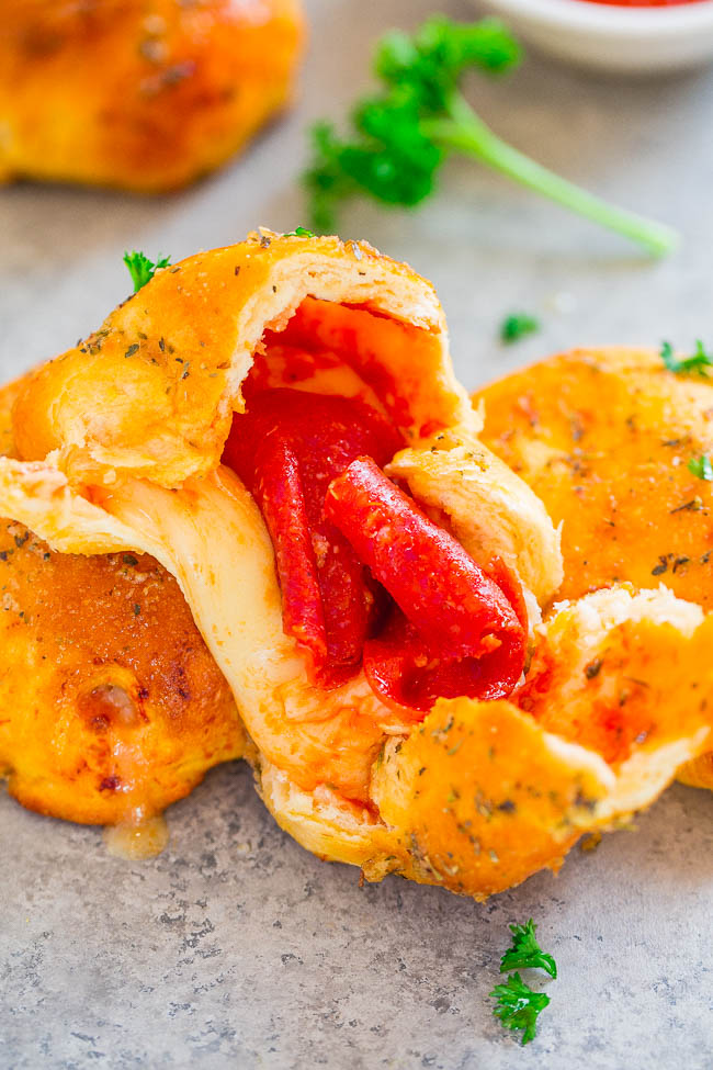 Pepperoni Pizza Balls — Pizza by way of soft, warm rolls stuffed with pepperoni and oodles of CHEESE!! Easy, ready in 15 minutes, perfect for PARTIES, and simply IRRESISTIBLE!!